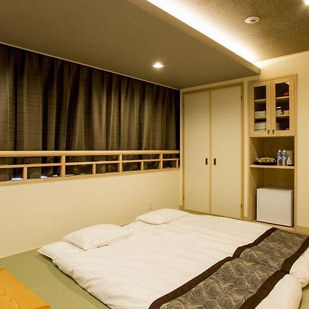 東心斎橋おおきにアパート Ookini Ryokan & Apartment Осака Екстериор снимка