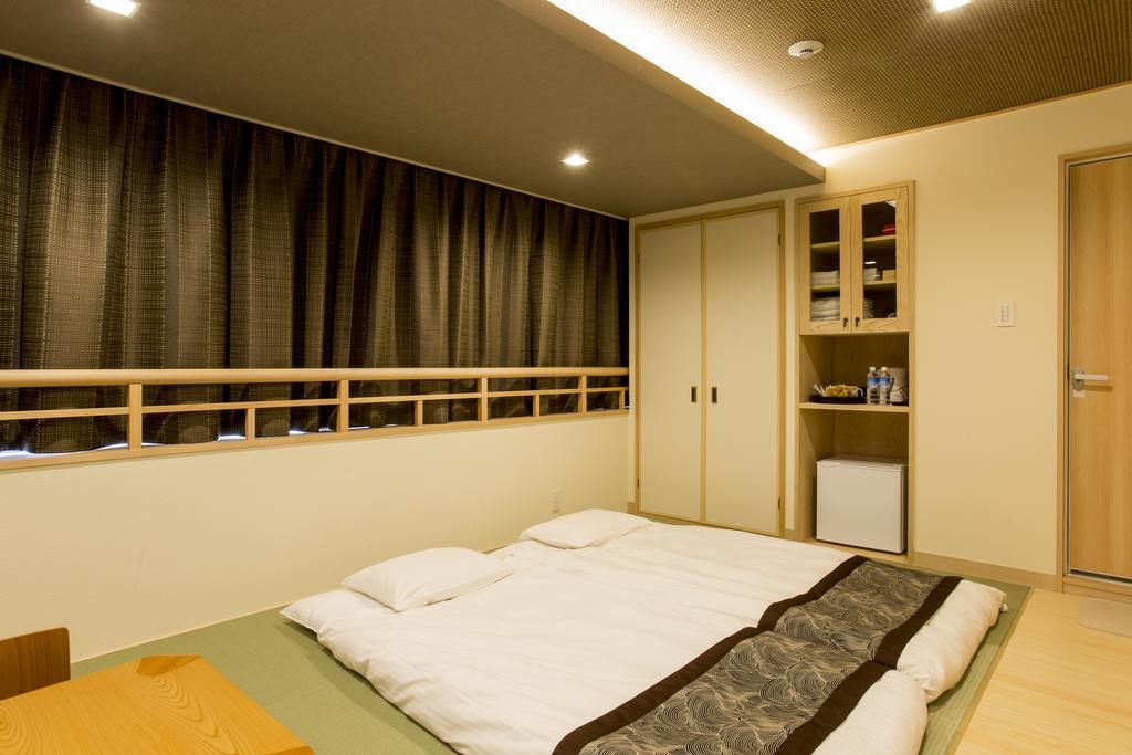 東心斎橋おおきにアパート Ookini Ryokan & Apartment Осака Екстериор снимка